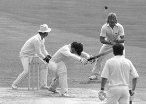 England's Ian Botham catches Aussie skipper Allan Border