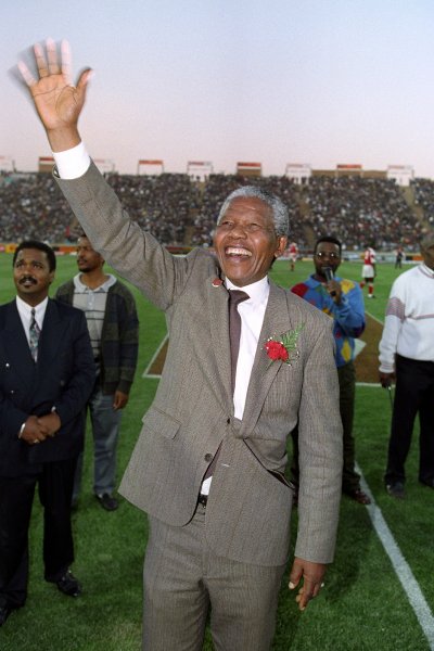 Nelson Mandela waves to the crowd in South Africa